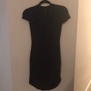 Black formfitting mid-length dress